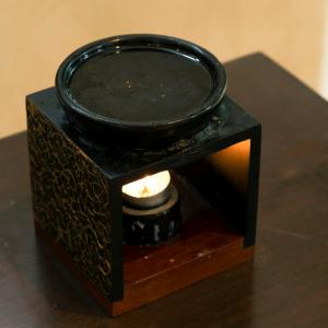 Oil burner on table