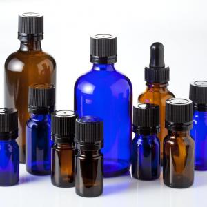 Brown and blue glass essential oil bottles