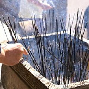 Burning incense sticks at Wutai Shan